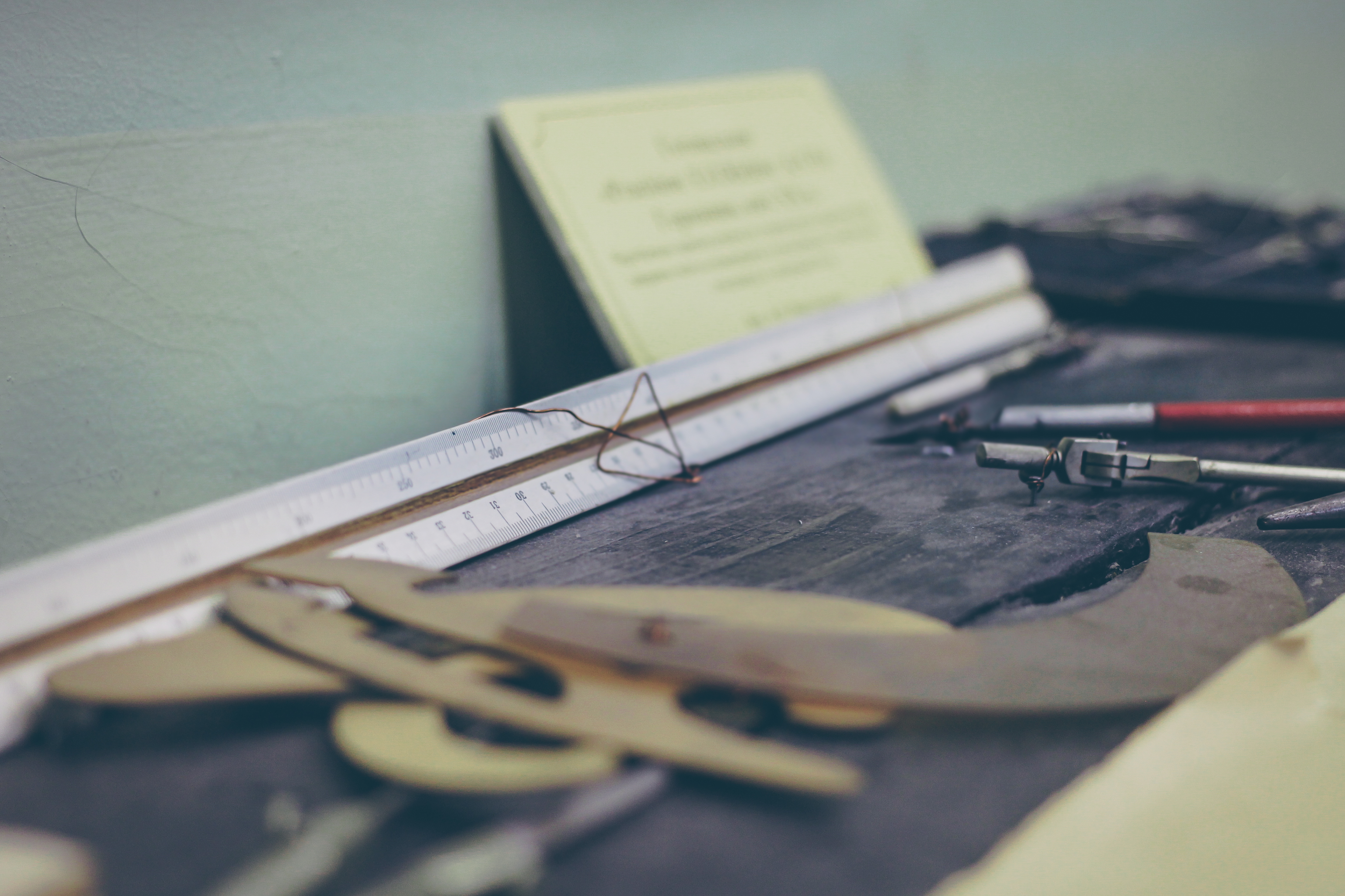 Photo of blueprints on desk by Szolkin